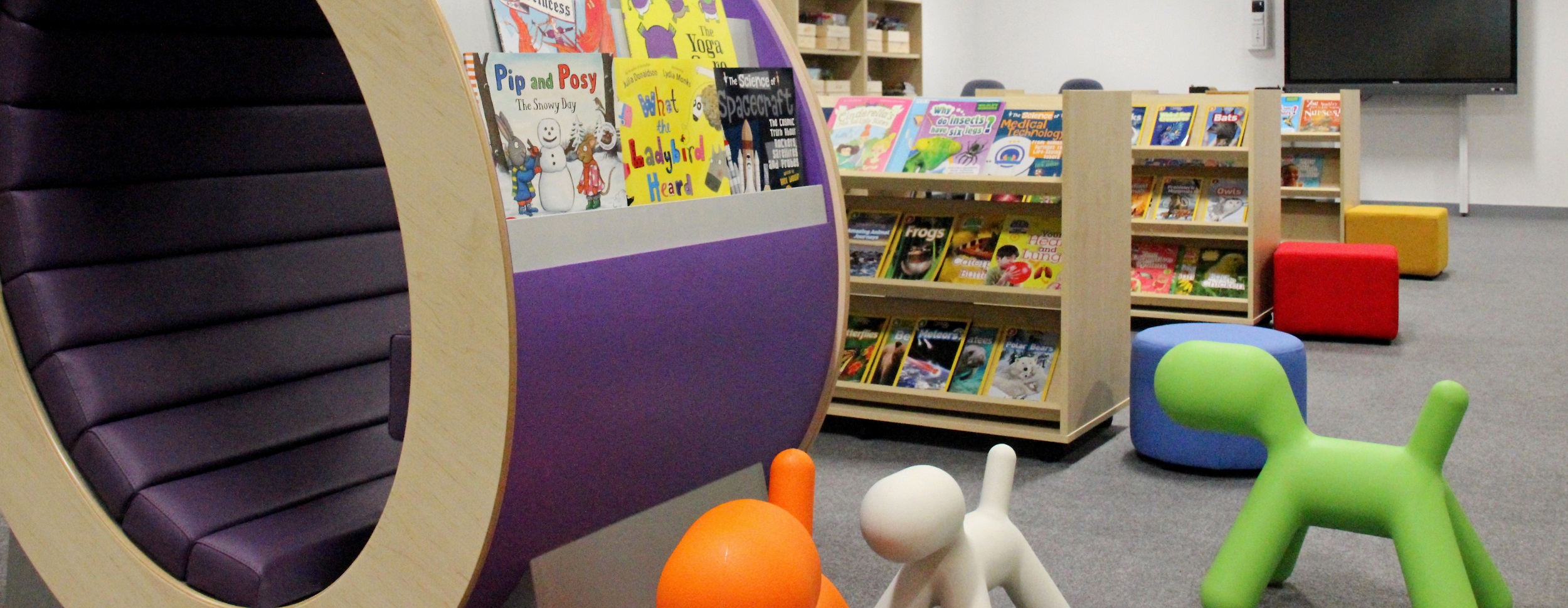 Library with bright artistic dog models